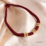 Red thread with gold semi Gundu